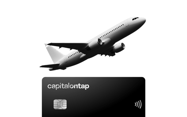 Black Capital On Tap Business Credit Card With A Plane Flying Over It (1)