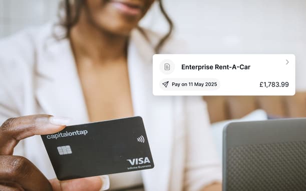 Woman Holding A Capital On Tap Business Credit Card Next To A Scheduled Bill Payment