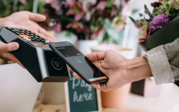 Person Using Capital On Tap Virtual Card To Pay For Flowers