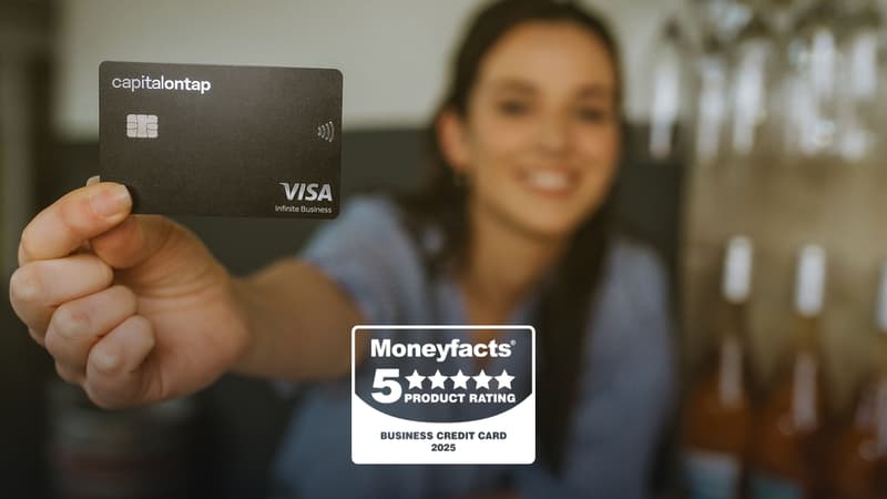 Woman In Wine Shop Holding Capital On Tap Business Credit Card With 5 Star Moneyfacts Logo 2025