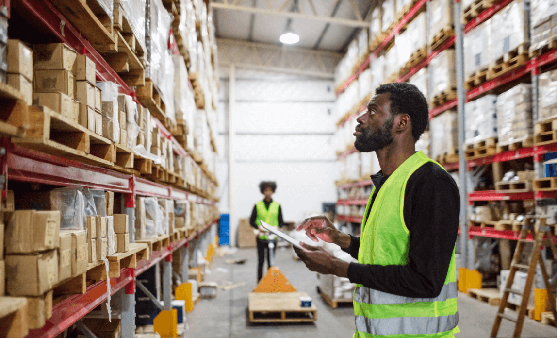Warehouse Worker Checking Inventory