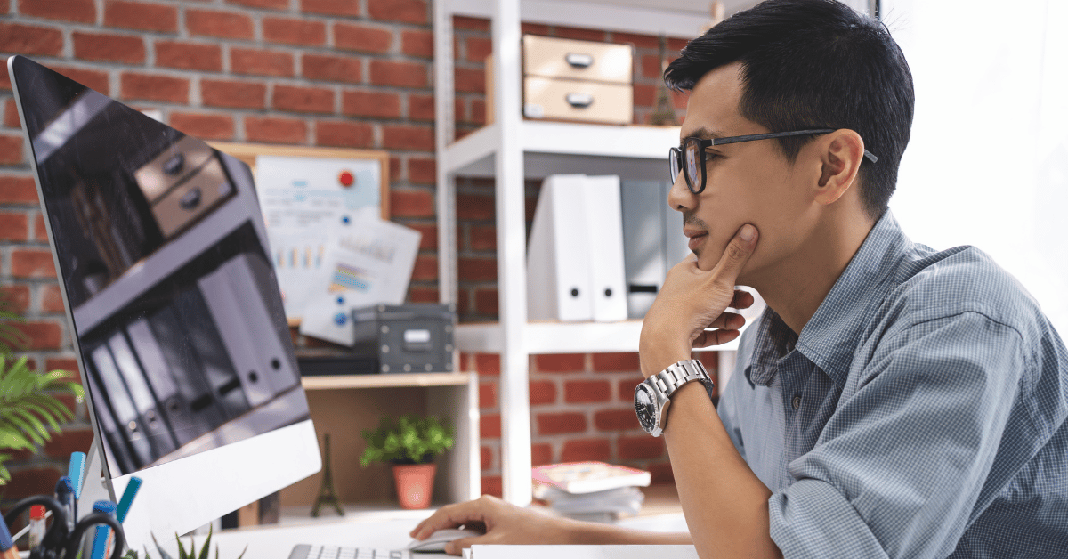 Man Using Computer In Office