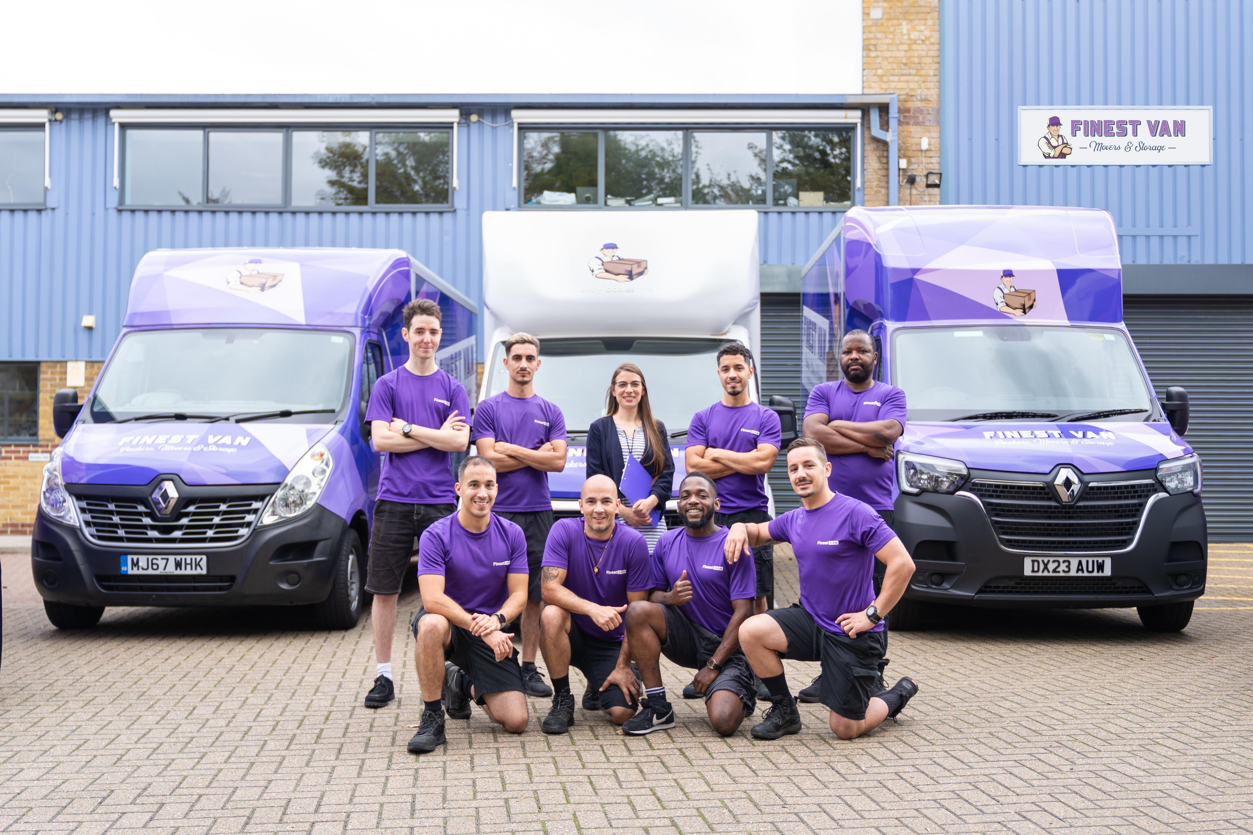 The Finest Van Team Posing In Front Of Three Finest Van Branded Vans