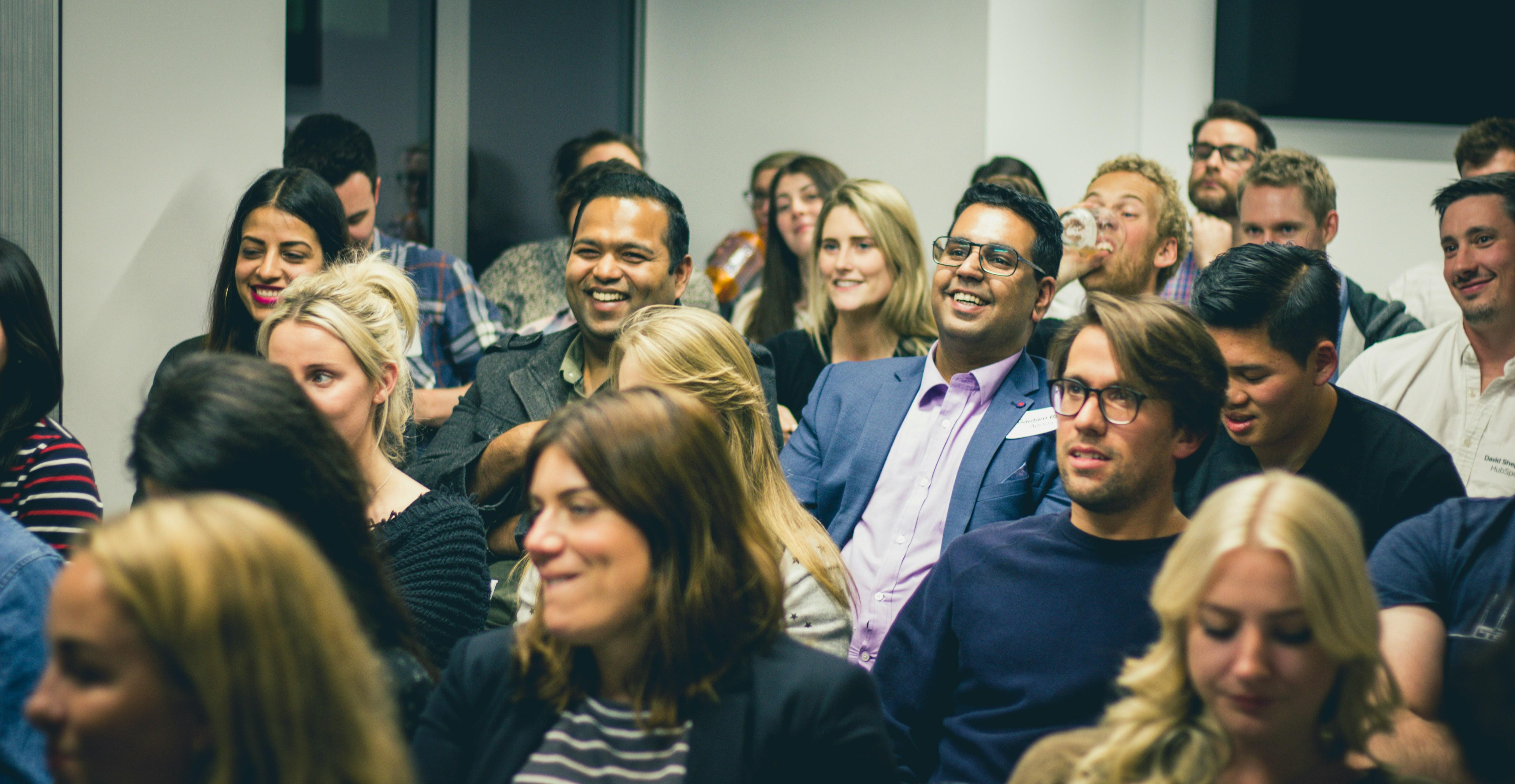 People Laughing In A Confernce Room