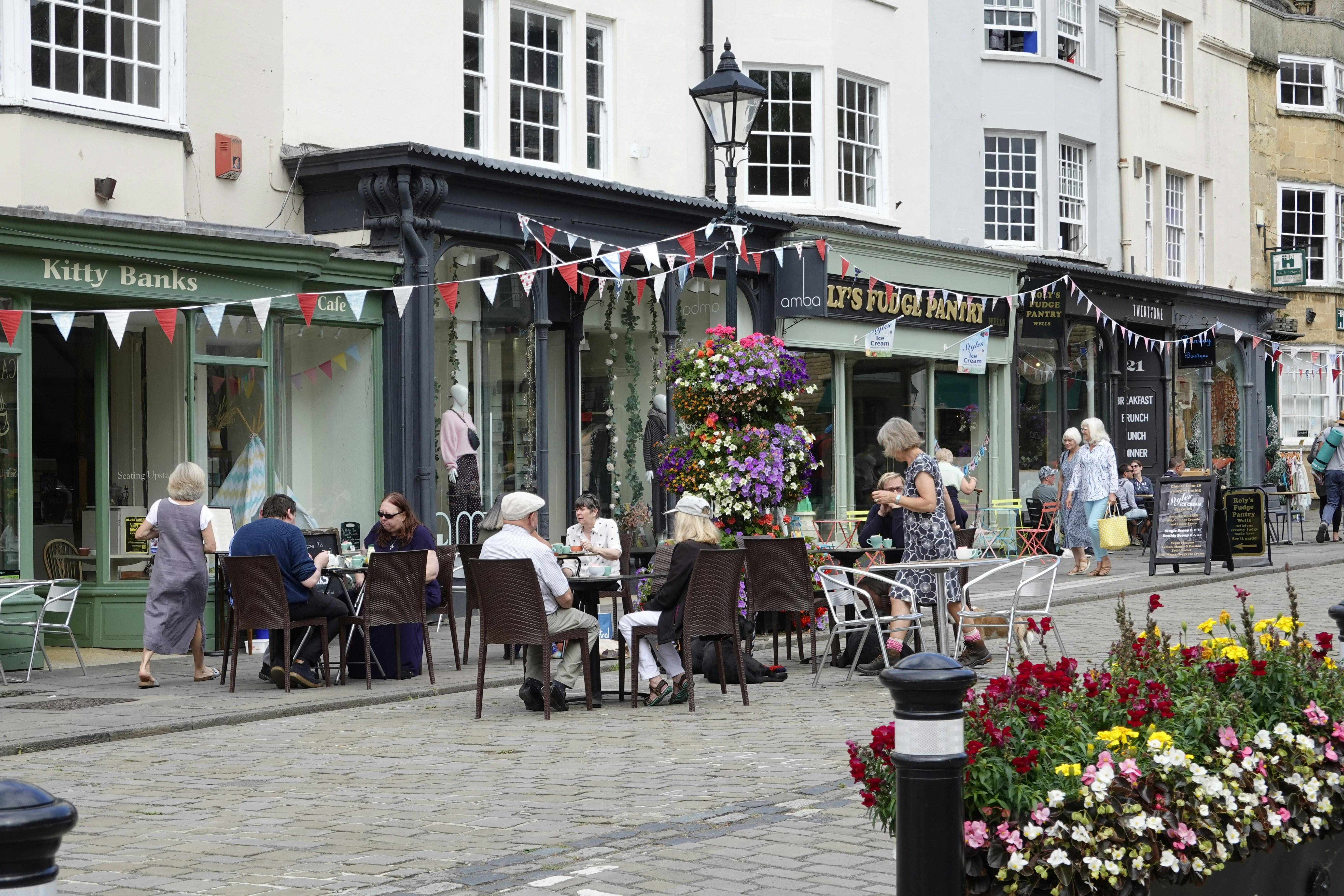 A Street Lined With Cafes And Shops