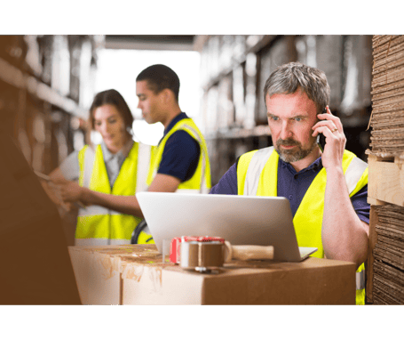 A Warehouse Owner Negotiates With A Supplier On The Phone