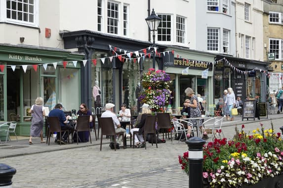 A Street Lined With Cafes And Shops