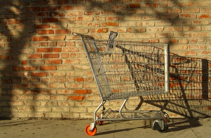 Trolley In Front Of Brick And Mortar Shop