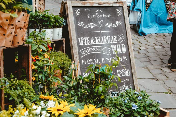 A Flower Display Outside A Small Florist Shop