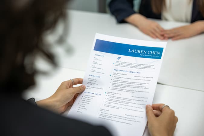 Woman Reading CV