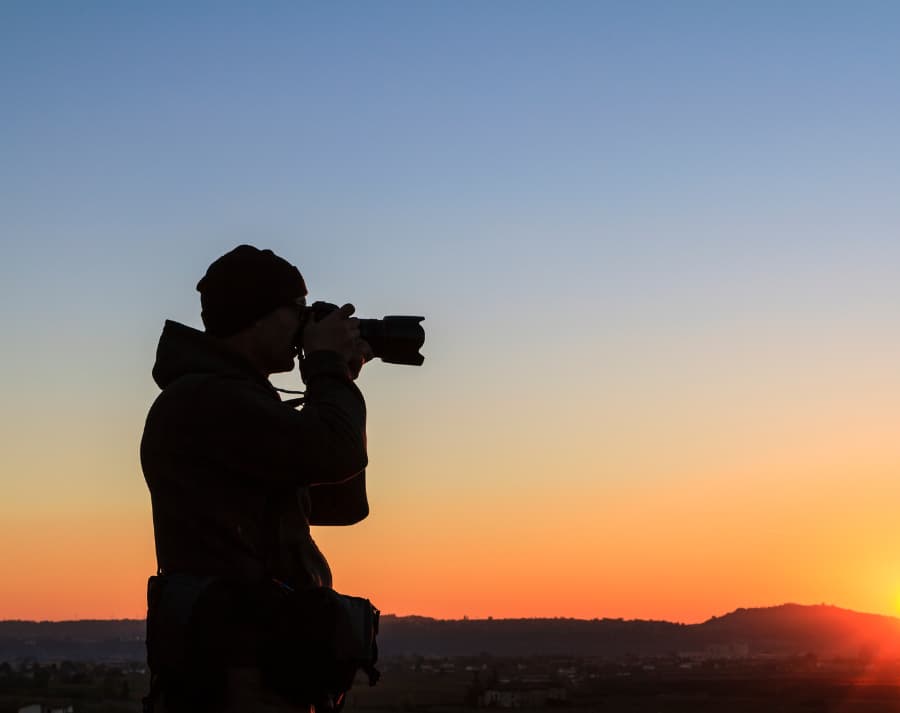 Photographer Against Sunset